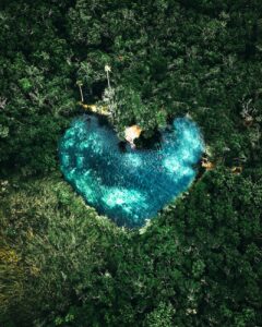 aerial view of cenote corazon del paraiso in tulum mexico